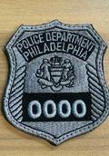 HER-PPD PO BADGE